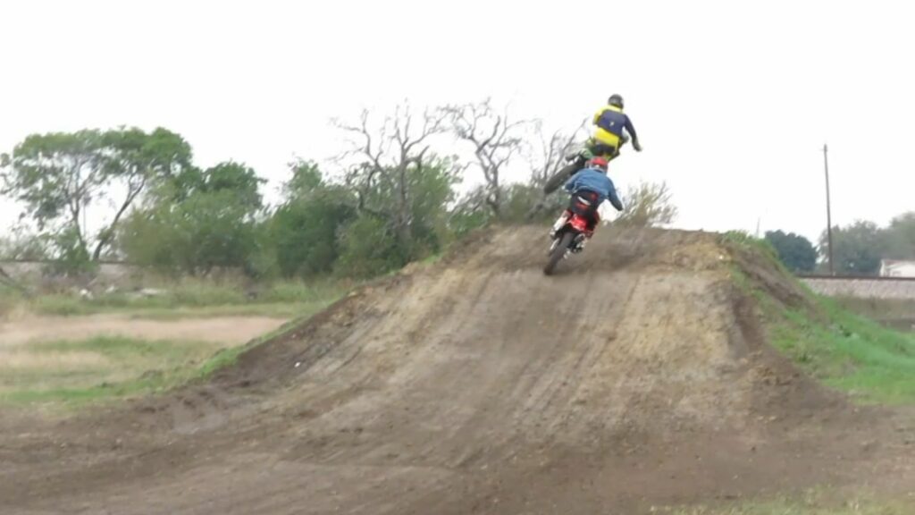Motocross Riders Back View Taking the Hill - MX Riesel Texas